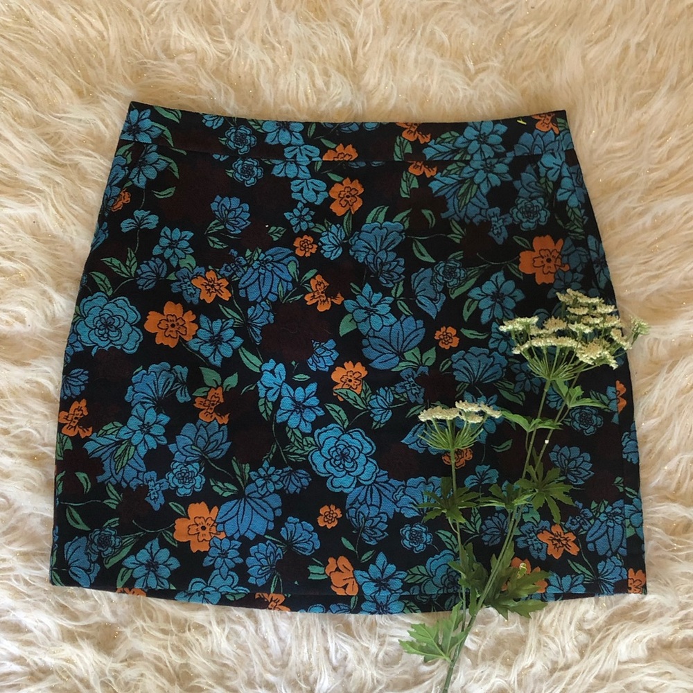 Loft mini-skirt unique blue/orange floral pattern.